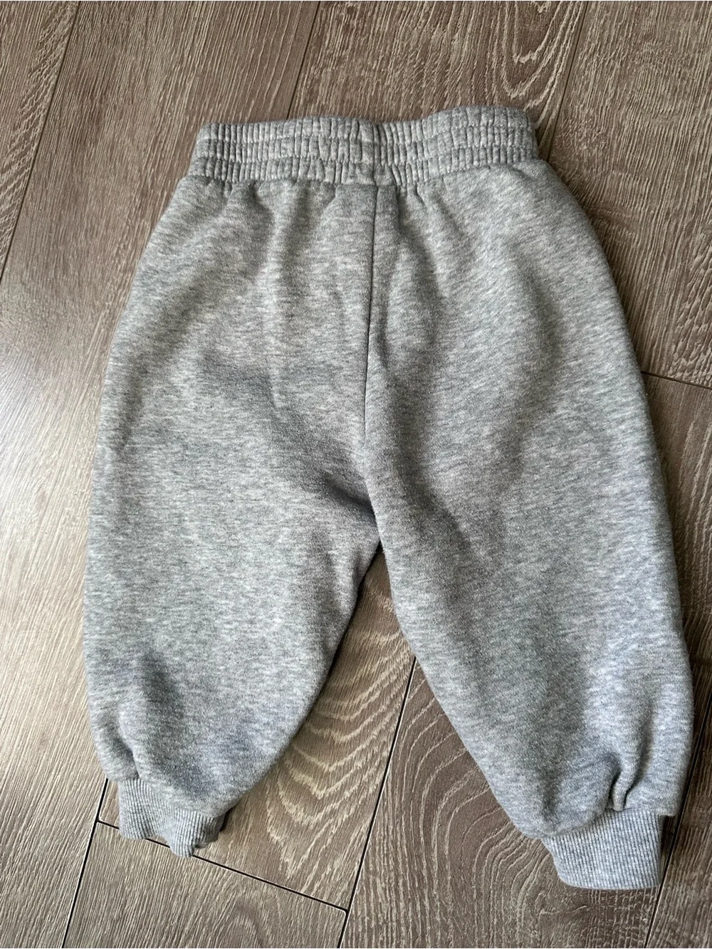 Nike Light Gray Kids Sweatpants with Black Swoosh